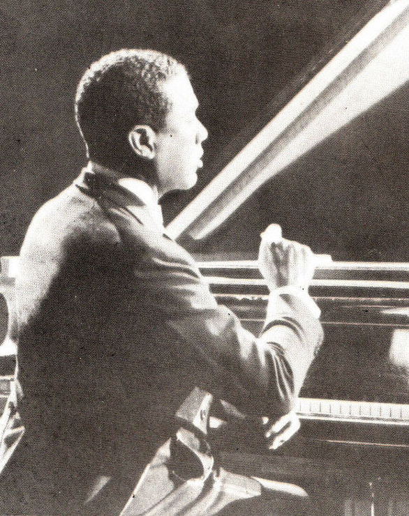 A portrait of Leslie Hutchinson (Hutch) at the piano